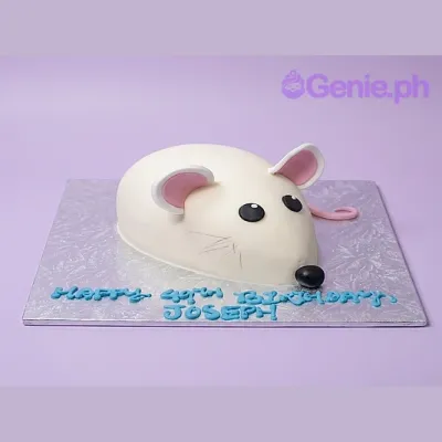 White mouse-shaped fondant cake for a 40th birthday with pink ears and blue piped message on the board White mouse-shaped fondant cake for a 40th birthday with pink ears and blue piped message on the board