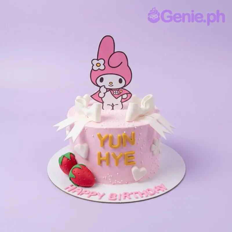 A pink 1-tier My Melody cake featuring a character printout, fondant strawberries, white bows, and yellow gumpaste letters. A pink 1-tier My Melody cake featuring a character printout, fondant strawberries, white bows, and yellow gumpaste letters.