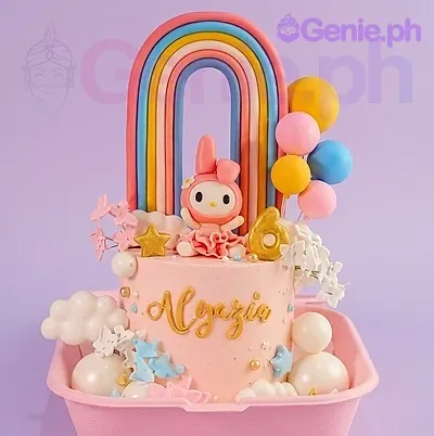 A pink 1-tier My Melody Rainbow cake with a My Melody character, large rainbow, and pastel balloons. A pink 1-tier My Melody Rainbow cake with a My Melody character, large rainbow, and pastel balloons.