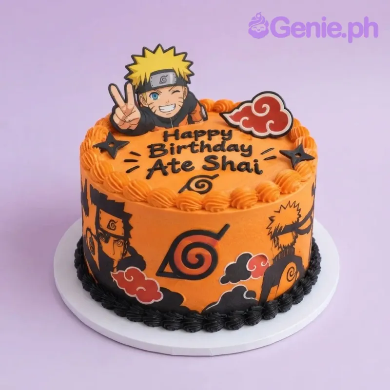 Bright orange 1-tier cake with soft icing, Naruto anime printouts, and black piped borders Bright orange 1-tier cake with soft icing, Naruto anime printouts, and black piped borders