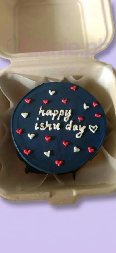 A navy blue bento cake themed around Navy Minimalist, featuring white and red piped icing hearts and a 'happy ishu day' message. A navy blue bento cake themed around Navy Minimalist, featuring white and red piped icing hearts and a 'happy ishu day' message.