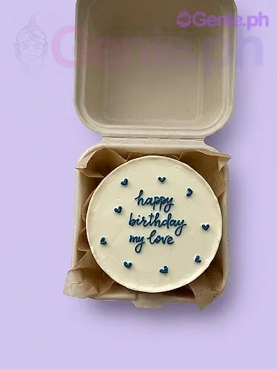 A white and navy blue Bento cake themed around Navy Minimalist, featuring "happy birthday my love" icing text and tiny icing hearts. A white and navy blue Bento cake themed around Navy Minimalist, featuring "happy birthday my love" icing text and tiny icing hearts.