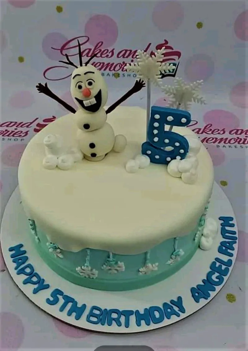 A light blue and white 1 Tier Fondant Olaf Frozen cake featuring an Olaf, blue number 5, and white snowflakes. A light blue and white 1 Tier Fondant Olaf Frozen cake featuring an Olaf, blue number 5, and white snowflakes.
