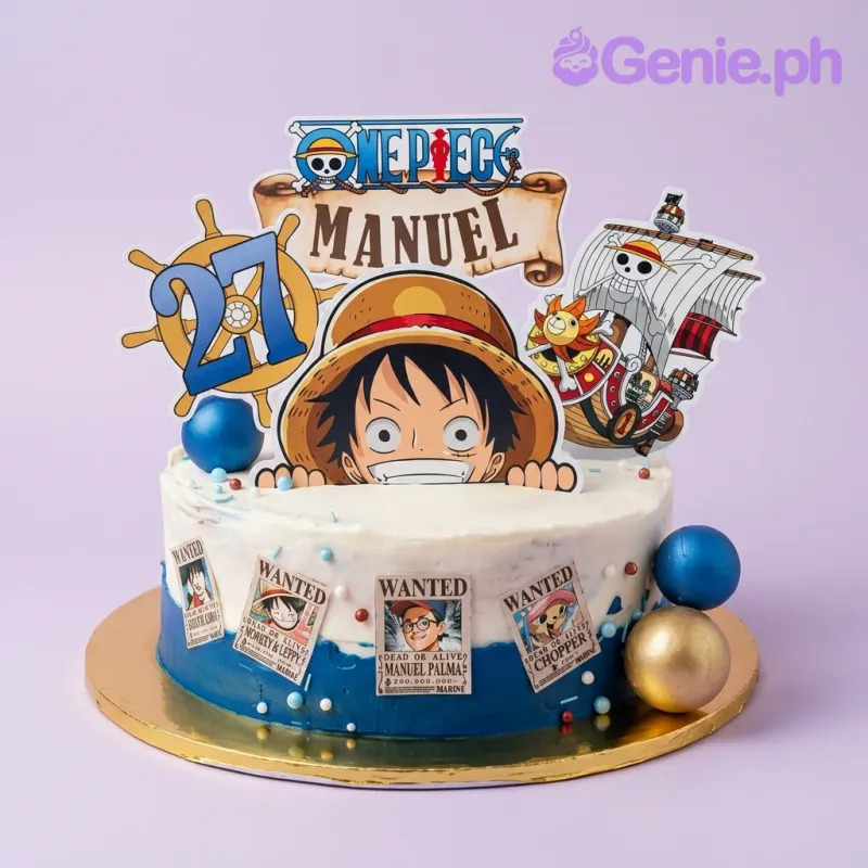 A white and blue 1-tier cake, One Piece themed, with Luffy, Thousand Sunny, wanted posters, spheres. A white and blue 1-tier cake, One Piece themed, with Luffy, Thousand Sunny, wanted posters, spheres.