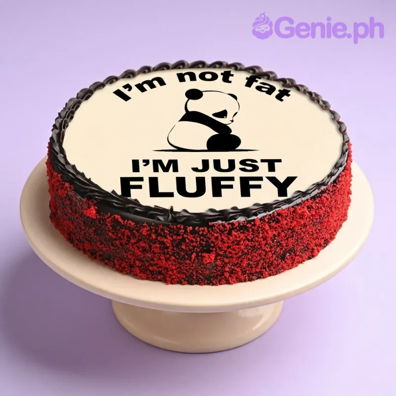 A white and red 1 Tier Panda Fluffy cake, featuring a panda printout and 'I'm not fat I'M JUST FLUFFY' text. A white and red 1 Tier Panda Fluffy cake, featuring a panda printout and 'I'm not fat I'M JUST FLUFFY' text.