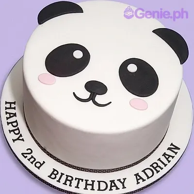 A white, black, and pink 1 Tier cake themed around Panda, featuring black fondant ears, eyes, nose, pink cheeks, and a message on the base. A white, black, and pink 1 Tier cake themed around Panda, featuring black fondant ears, eyes, nose, pink cheeks, and a message on the base.