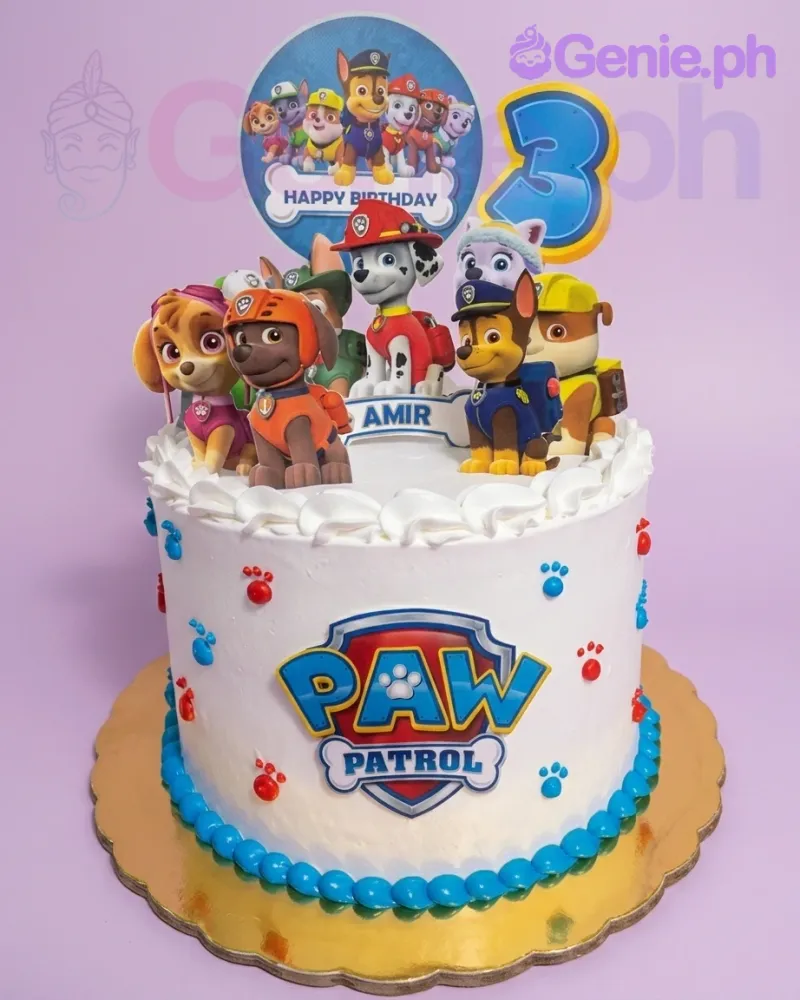 A white 1 Tier cake themed around Paw Patrol, featuring character printouts, a blue number three, and blue and red paw prints. A white 1 Tier cake themed around Paw Patrol, featuring character printouts, a blue number three, and blue and red paw prints.