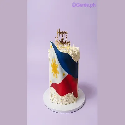 White 1-tier cake with soft icing, a Philippine flag printout wrap, white piped rosettes, and a gold glitter Happy Birthday topper White 1-tier cake with soft icing, a Philippine flag printout wrap, white piped rosettes, and a gold glitter Happy Birthday topper