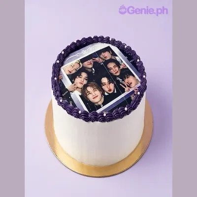 White 1 tier cake with a large rectangular photo print of a group, purple piped icing border with white dots, and white icing pearls White 1 tier cake with a large rectangular photo print of a group, purple piped icing border with white dots, and white icing pearls