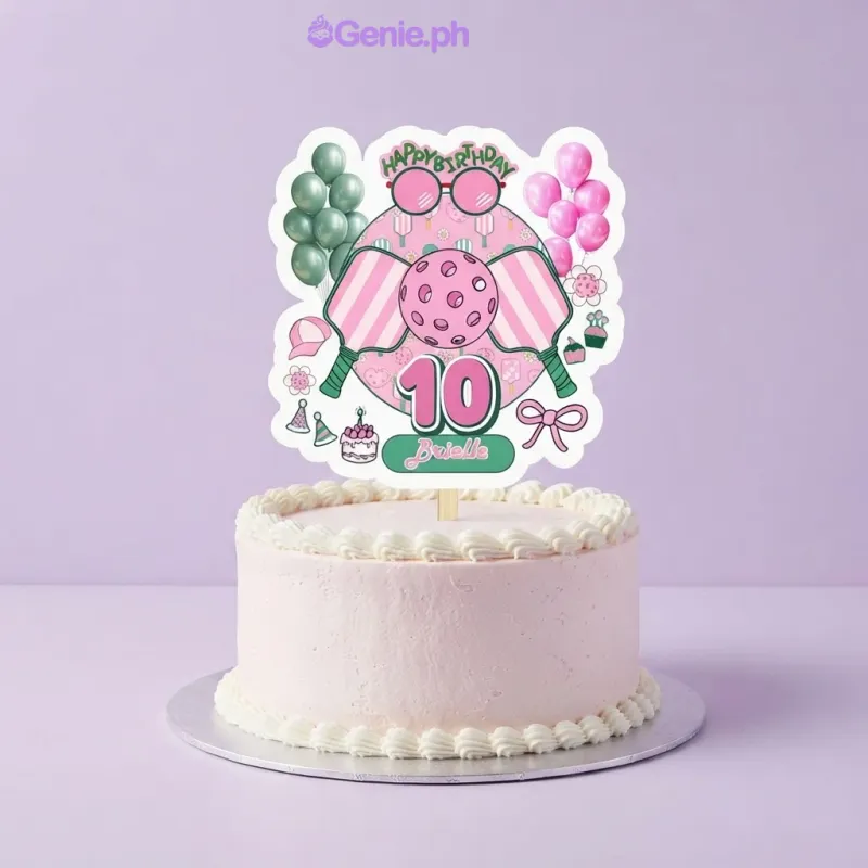 White 1-tier cake with soft icing and a large pickleball-themed printed birthday topper White 1-tier cake with soft icing and a large pickleball-themed printed birthday topper