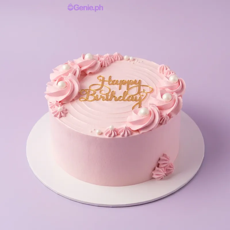 Light pink 1-tier birthday cake with gold Happy Birthday topper and white pearl accents Light pink 1-tier birthday cake with gold Happy Birthday topper and white pearl accents