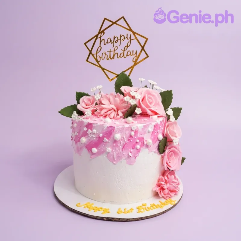 A white and pink 1 Tier cake themed around Pink Floral, featuring a gold geometric Happy Birthday topper and pink gumpaste roses. A white and pink 1 Tier cake themed around Pink Floral, featuring a gold geometric Happy Birthday topper and pink gumpaste roses.