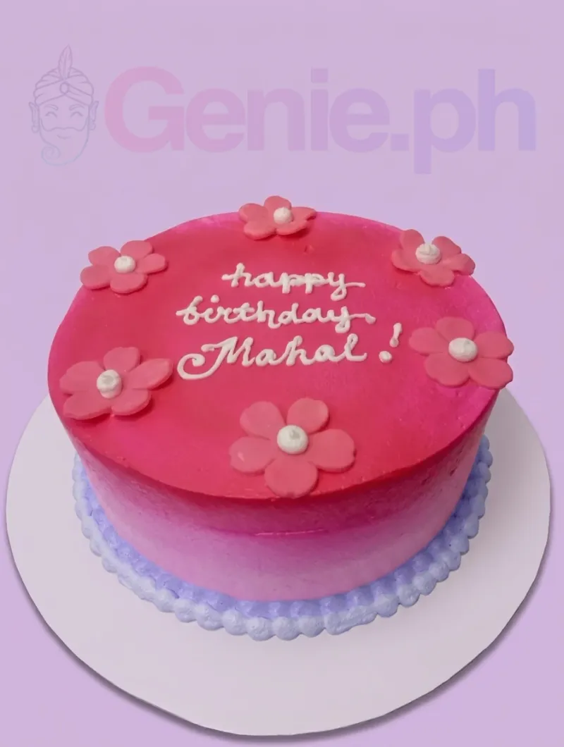 A pink and white 1 Tier cake themed around Pink Ombre, featuring six pink fondant flowers and a white icing message with a piped base border. A pink and white 1 Tier cake themed around Pink Ombre, featuring six pink fondant flowers and a white icing message with a piped base border.