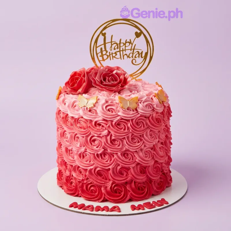A pink ombre 1-tier rosette cake featuring a gold Happy Birthday topper, red fondant roses, gold butterflies, and a "MAMA MELY" message. A pink ombre 1-tier rosette cake featuring a gold Happy Birthday topper, red fondant roses, gold butterflies, and a "MAMA MELY" message.