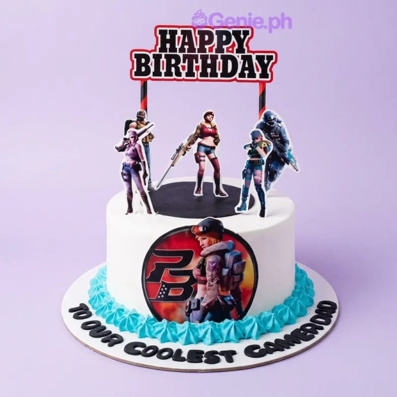 A white 1-tier Point Blank Gamer cake, featuring character printouts, a 'Happy Birthday' banner, and a blue icing border. A white 1-tier Point Blank Gamer cake, featuring character printouts, a 'Happy Birthday' banner, and a blue icing border.