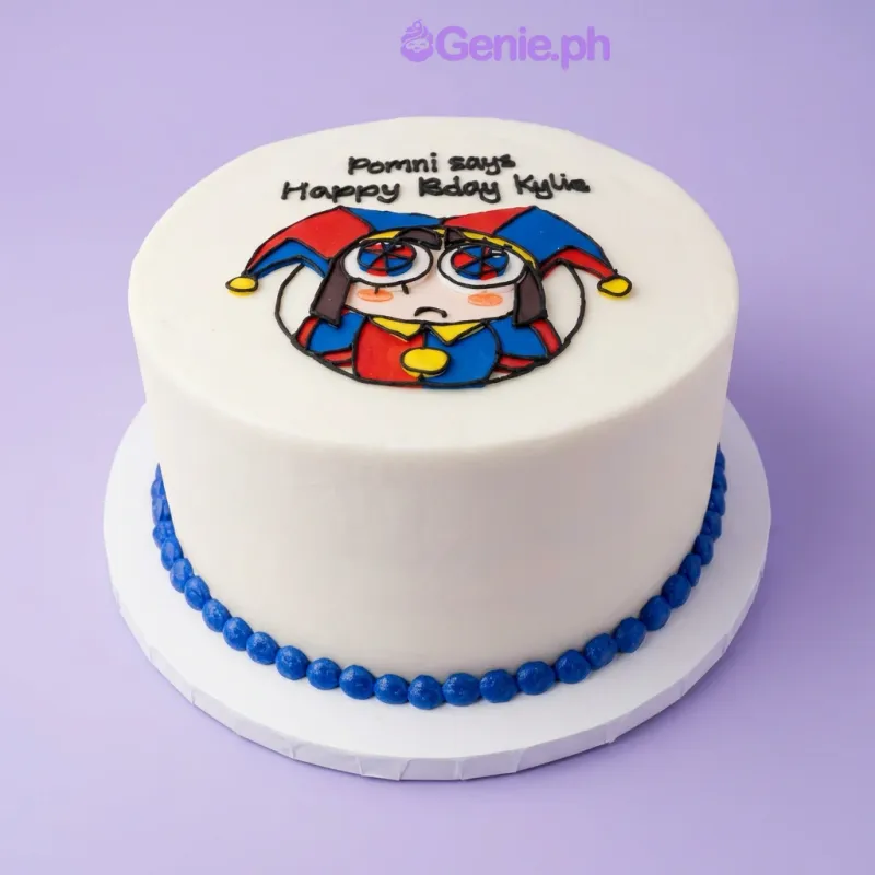White 1-tier cake with Pomni character graphic on top and blue piped border White 1-tier cake with Pomni character graphic on top and blue piped border