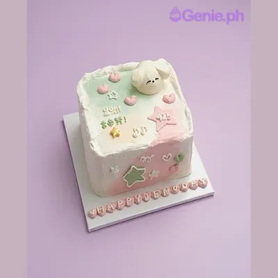 White square cake with soft icing, a puppy face topper, and a pink star with a number White square cake with soft icing, a puppy face topper, and a pink star with a number