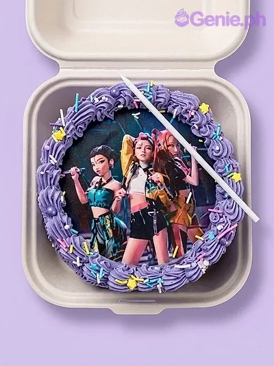 A purple 1 Tier cake, themed Purple Character, featuring a character group printout, purple rosettes, and multi-colored sprinkles. A purple 1 Tier cake, themed Purple Character, featuring a character group printout, purple rosettes, and multi-colored sprinkles.