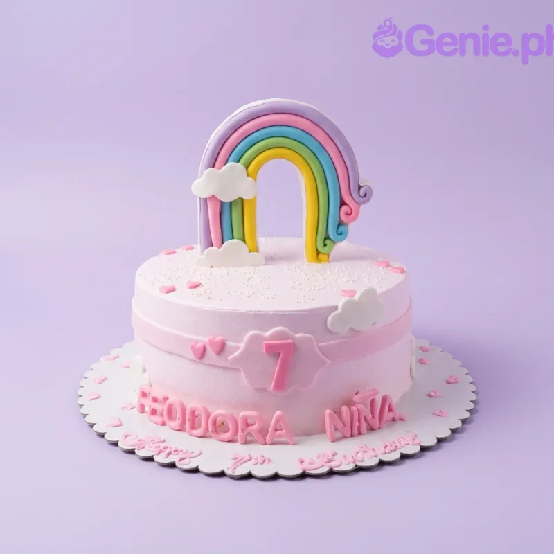 A pink 1-tier cake themed Rainbow, featuring a rainbow, pink number 7, white clouds, and pink hearts. A pink 1-tier cake themed Rainbow, featuring a rainbow, pink number 7, white clouds, and pink hearts.