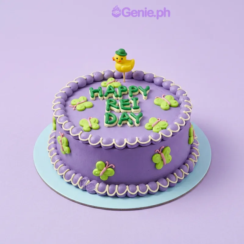 Purple 1-tier birthday cake with green butterfly decorations and Happy Rei Day message Purple 1-tier birthday cake with green butterfly decorations and Happy Rei Day message