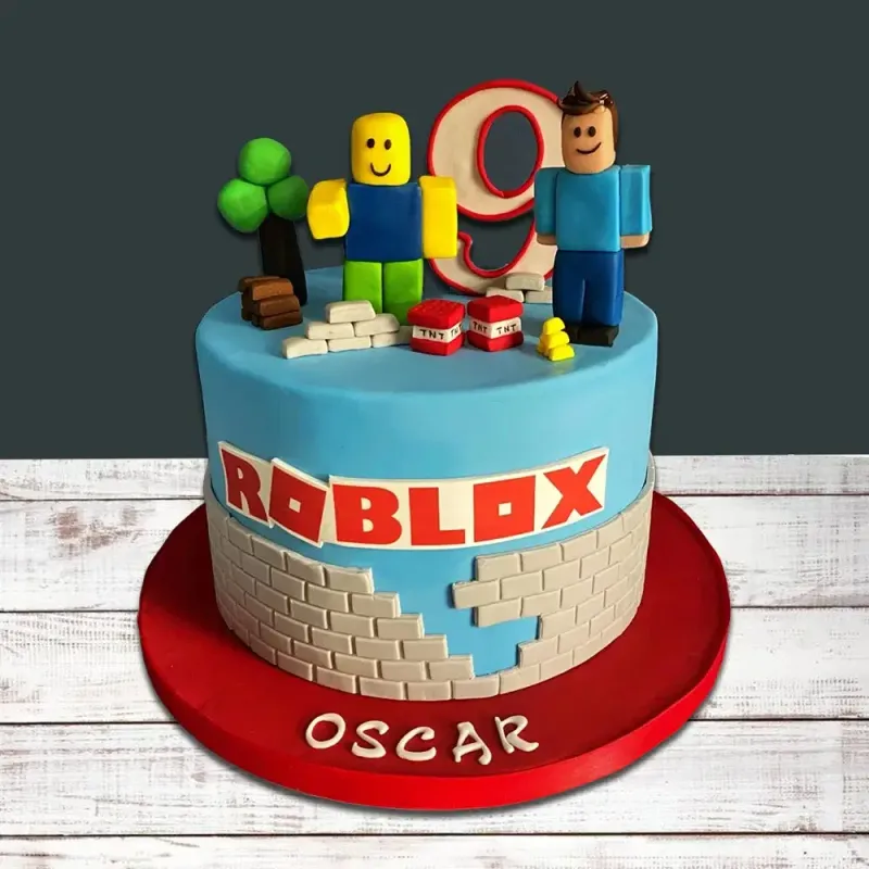 Light blue fondant cake with Roblox character toppers and brick wall design for a 9th birthday Light blue fondant cake with Roblox character toppers and brick wall design for a 9th birthday
