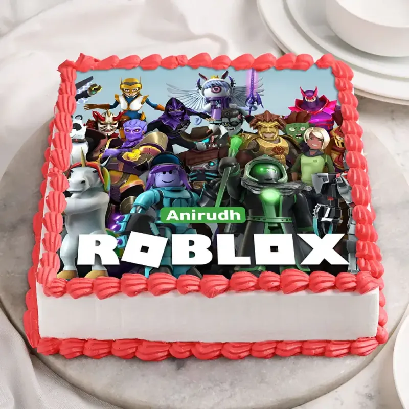 Square white cake with red piped border and large Roblox character edible photo print on top Square white cake with red piped border and large Roblox character edible photo print on top