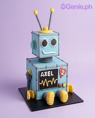 Light blue square fondant robot cake with a robot head topper, yellow antennae, and robot arm and leg accents Light blue square fondant robot cake with a robot head topper, yellow antennae, and robot arm and leg accents