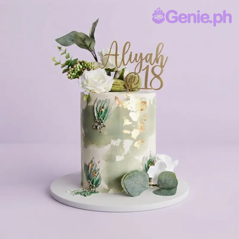 Sage green 1 tier soft icing cake with gold leaf flakes, palette knife floral strokes, white roses, and a gold acrylic name topper Sage green 1 tier soft icing cake with gold leaf flakes, palette knife floral strokes, white roses, and a gold acrylic name topper