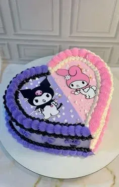 Heart-shaped cake with lavender and pink soft icing, featuring Kuromi and My Melody printouts and piped shell borders Heart-shaped cake with lavender and pink soft icing, featuring Kuromi and My Melody printouts and piped shell borders
