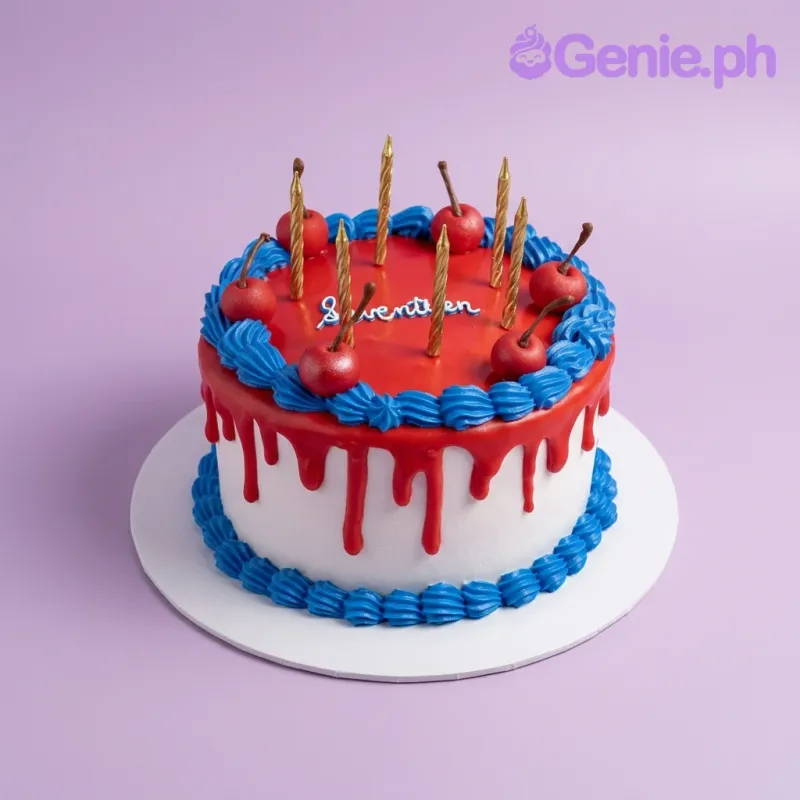 A red, white, and blue 1-tier cake for a seventeenth birthday, featuring gold candles, red cherries, blue icing borders, and 'Seventeen' text. A red, white, and blue 1-tier cake for a seventeenth birthday, featuring gold candles, red cherries, blue icing borders, and 'Seventeen' text.