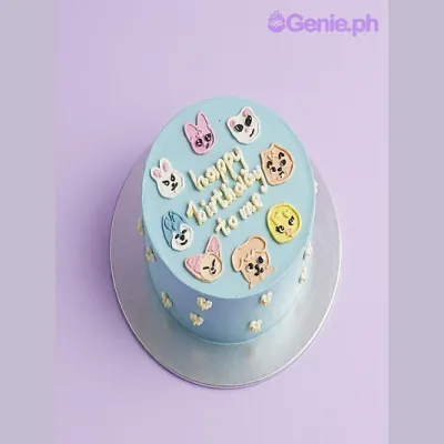 Light blue 1-tier birthday cake with printed SKZOO character faces and piped Happy Birthday message Light blue 1-tier birthday cake with printed SKZOO character faces and piped Happy Birthday message
