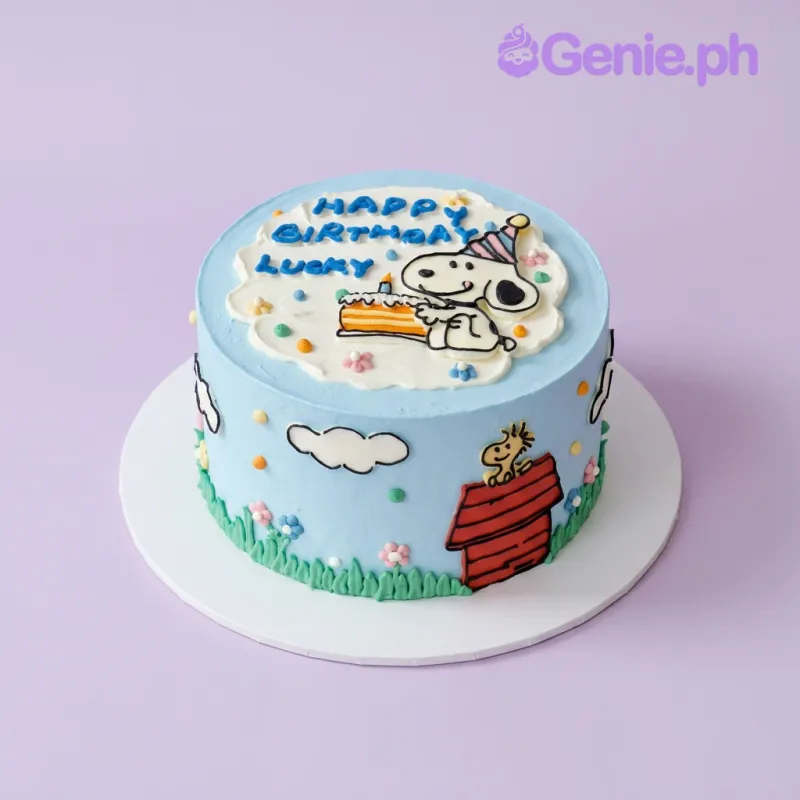 Light blue round birthday cake with Snoopy character topper and doghouse decoration Light blue round birthday cake with Snoopy character topper and doghouse decoration