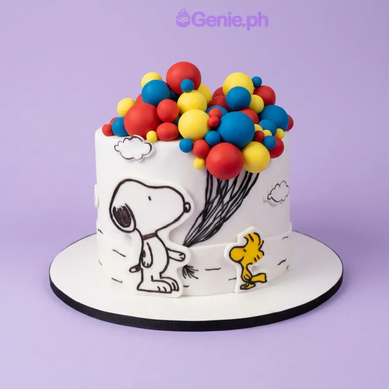 Snoopy and Woodstock character cutouts with fondant balloons and clouds on a white 1-tier fondant cake Snoopy and Woodstock character cutouts with fondant balloons and clouds on a white 1-tier fondant cake