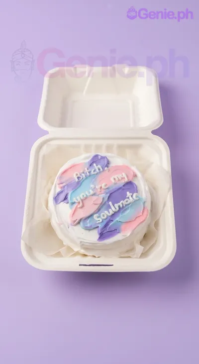 A white bento cake themed around soulmates, featuring pink, blue, and purple palette knife icing strokes and a handwritten message. A white bento cake themed around soulmates, featuring pink, blue, and purple palette knife icing strokes and a handwritten message.
