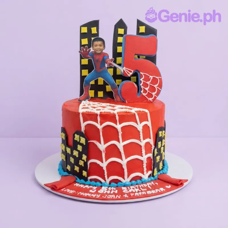 Bright red 1-tier birthday cake with smooth soft icing, Spider-Man theme, and a printed character cutout Bright red 1-tier birthday cake with smooth soft icing, Spider-Man theme, and a printed character cutout