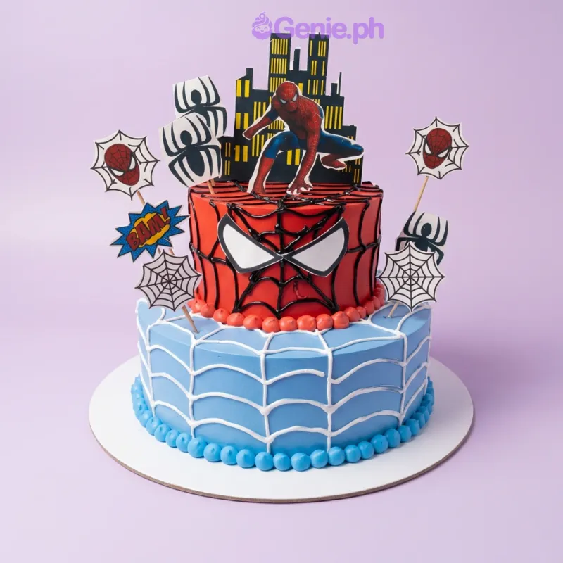 Red and blue 2-tier Spider-Man cake with soft icing, web piping, and various character printout toppers. Red and blue 2-tier Spider-Man cake with soft icing, web piping, and various character printout toppers.