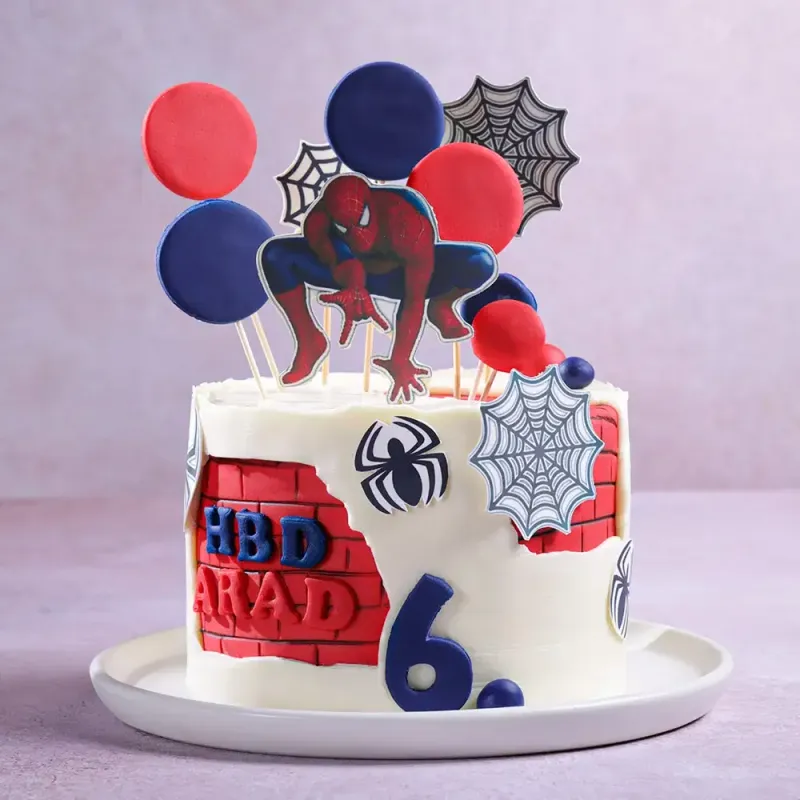 White 1-tier soft icing birthday cake with a Spiderman cutout, red brick panel, and blue age topper White 1-tier soft icing birthday cake with a Spiderman cutout, red brick panel, and blue age topper