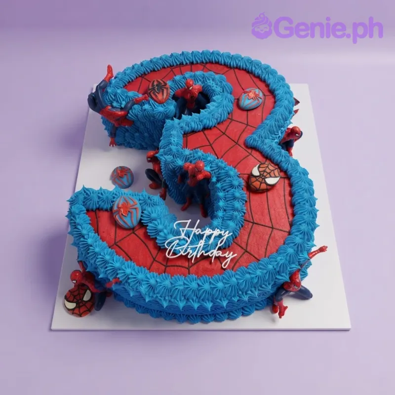 Red and blue number 3 cake with Spiderman action figures, logo plaques, and a Happy Birthday topper Red and blue number 3 cake with Spiderman action figures, logo plaques, and a Happy Birthday topper