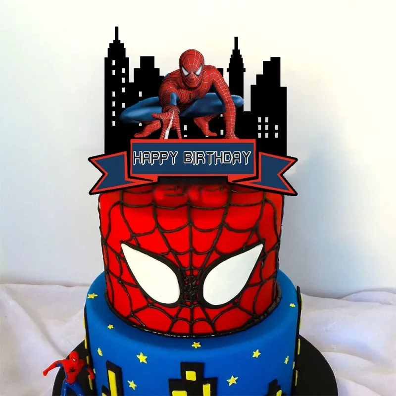 Red and blue 2-tier fondant birthday cake with Spiderman printouts, city skyline panels, and yellow star accents Red and blue 2-tier fondant birthday cake with Spiderman printouts, city skyline panels, and yellow star accents
