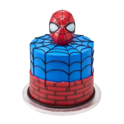 Blue and red 1-tier cake with soft icing, a Spiderman mask topper, brick side panel, and black piped spider web lines Blue and red 1-tier cake with soft icing, a Spiderman mask topper, brick side panel, and black piped spider web lines