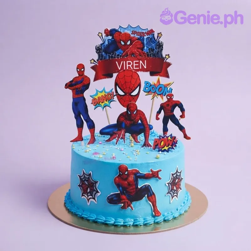 Light blue 1-tier birthday cake with smooth soft icing, Spiderman printouts, and custom name banner Light blue 1-tier birthday cake with smooth soft icing, Spiderman printouts, and custom name banner