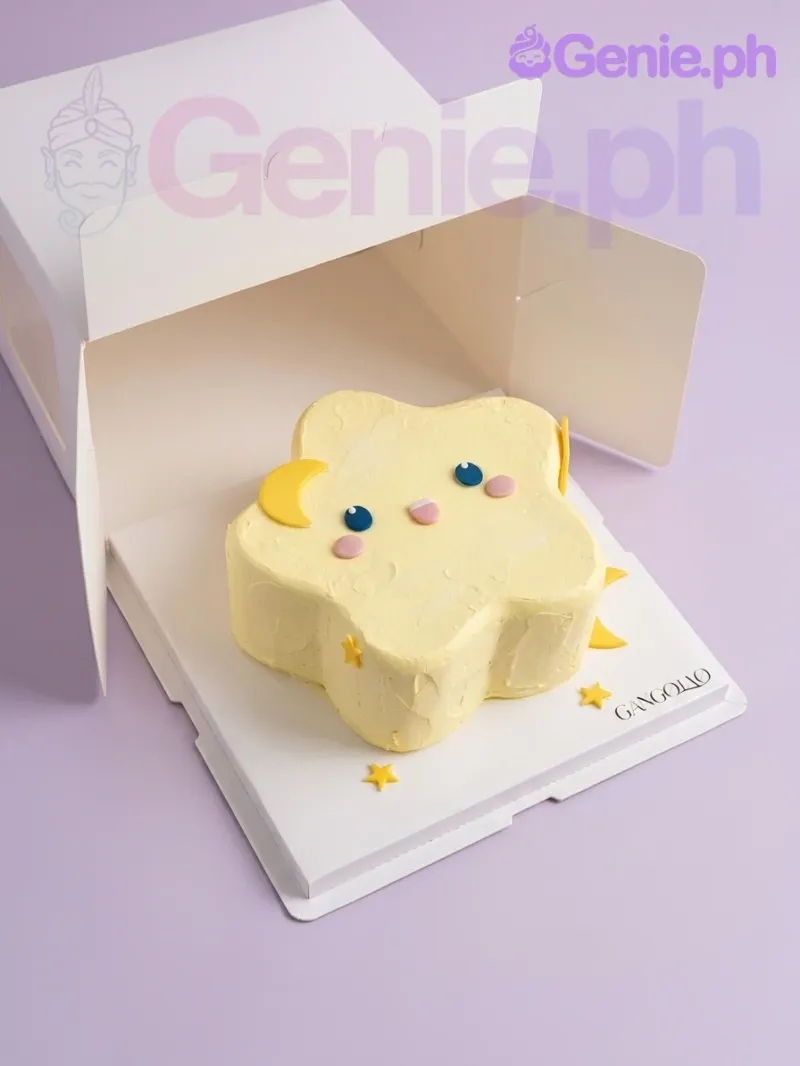A Yellow and White 1 Tier cake themed around a star, featuring a cute face, a yellow crescent moon, and small yellow stars. A Yellow and White 1 Tier cake themed around a star, featuring a cute face, a yellow crescent moon, and small yellow stars.