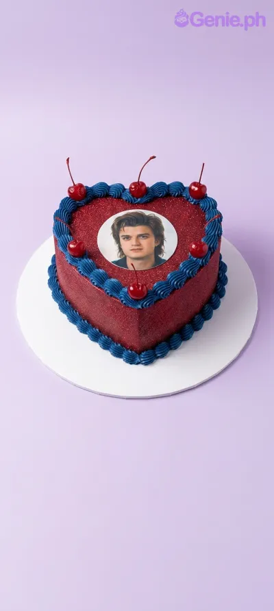 A dark red heart-shaped cake themed for Steve Harrington, featuring a printed photo, blue icing borders, and red cherries. A dark red heart-shaped cake themed for Steve Harrington, featuring a printed photo, blue icing borders, and red cherries.
