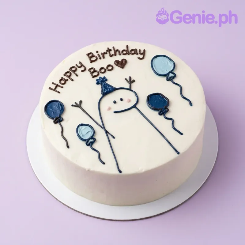 White bento cake with a stick figure wearing a blue party hat, blue balloons, and 'Happy Birthday Boo' message. White bento cake with a stick figure wearing a blue party hat, blue balloons, and 'Happy Birthday Boo' message.