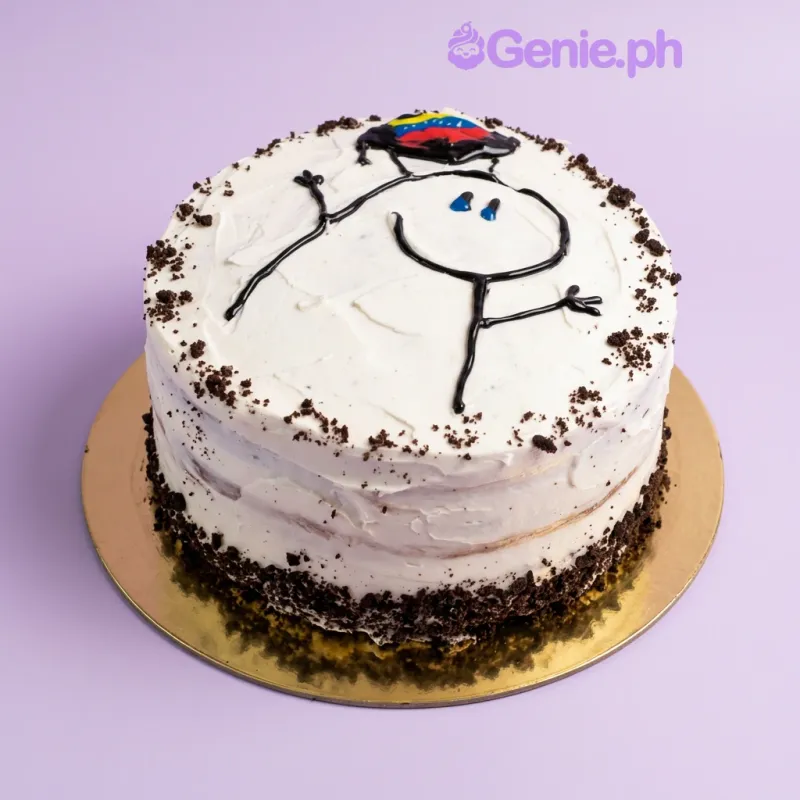 White 1-tier cake with a black icing stick figure drawing and a small colorful printout on top with chocolate crumb accents White 1-tier cake with a black icing stick figure drawing and a small colorful printout on top with chocolate crumb accents