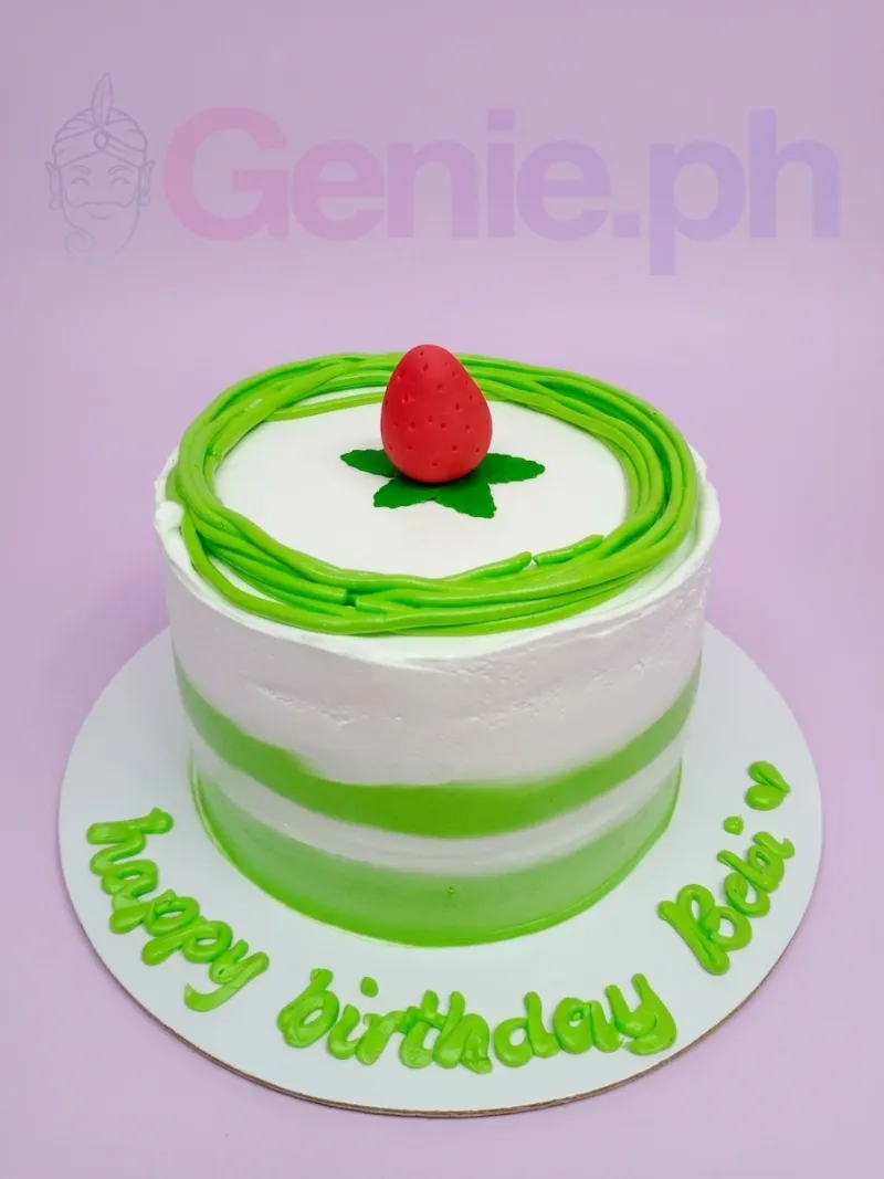 A white and green 1-tier cake, Strawberry Minimalist theme, with a fondant strawberry topper and green icing details. A white and green 1-tier cake, Strawberry Minimalist theme, with a fondant strawberry topper and green icing details.