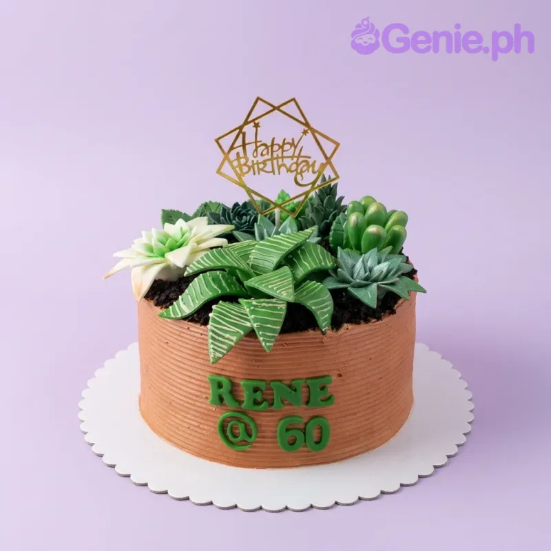 A brown, black, green, white, and gold 1 Tier cake themed around Succulent, featuring a gold geometric topper and assorted green fondant succulents. A brown, black, green, white, and gold 1 Tier cake themed around Succulent, featuring a gold geometric topper and assorted green fondant succulents.