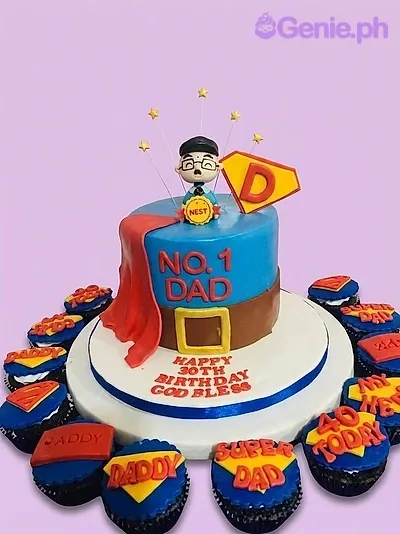 Blue and brown superhero dad cake with a red fondant cape, a 3D dad figure, and matching cupcakes. Blue and brown superhero dad cake with a red fondant cape, a 3D dad figure, and matching cupcakes.