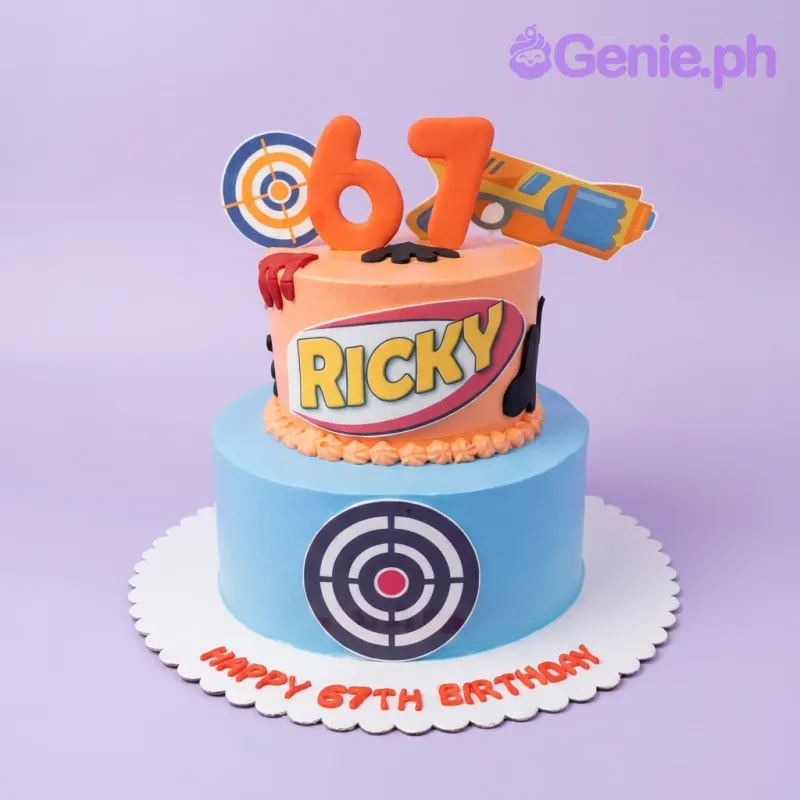 A two-tier orange and blue Target-themed cake with orange number 67 and toy gun printouts. A two-tier orange and blue Target-themed cake with orange number 67 and toy gun printouts.