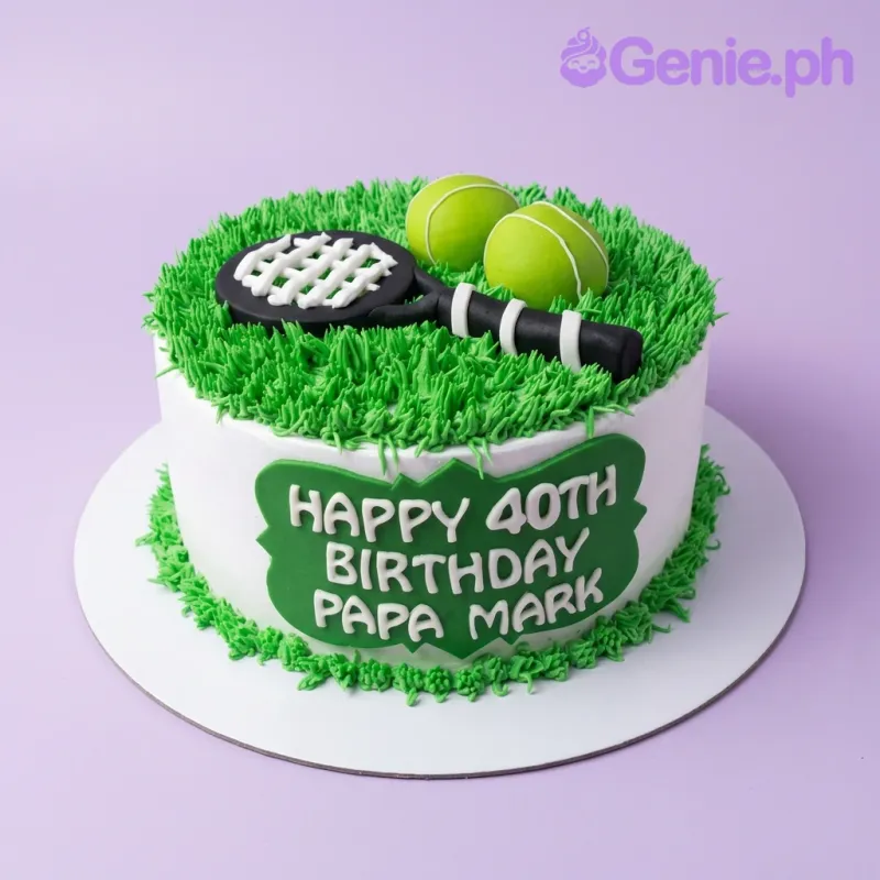 A green and white 1-tier Tennis cake, featuring a black and white tennis racket, two green tennis balls, and green grass icing. A green and white 1-tier Tennis cake, featuring a black and white tennis racket, two green tennis balls, and green grass icing.